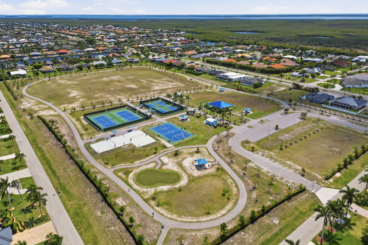 Park is across the street - beach volleyball, playground, basketball, putting green, & walking trails.