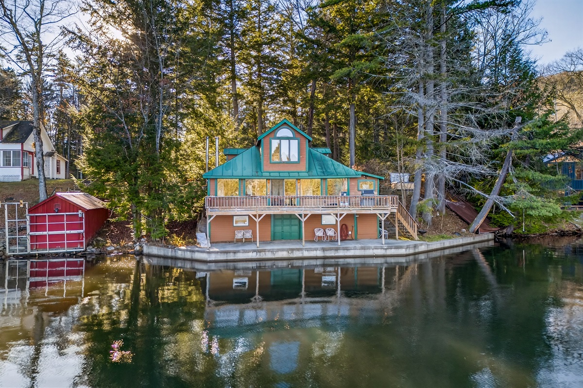 Main entry porch with seating and water views.