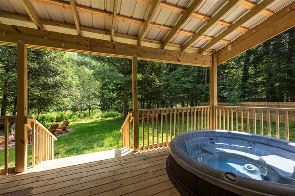 Soak in the hot tub surrounded by the beauty of Northern Michigan.