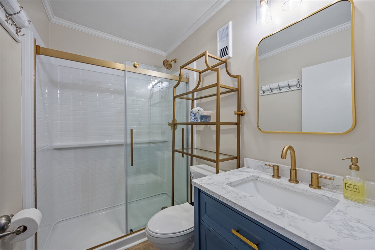Clean bathroom with walk in shower