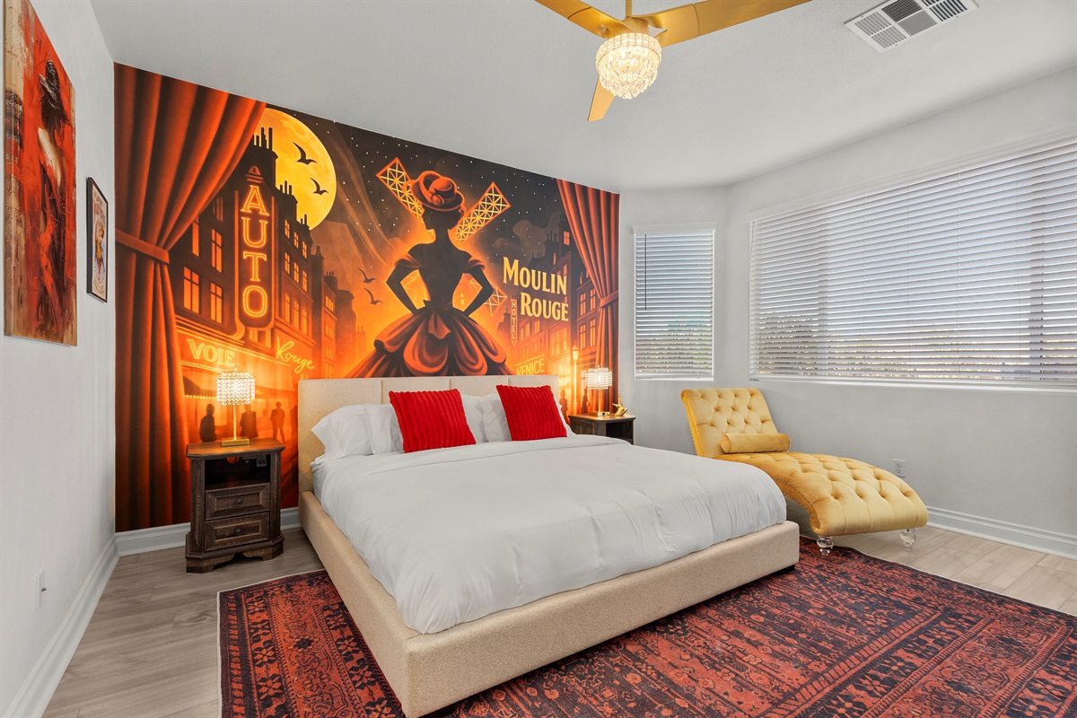Moulin Rouge musical themed bedroom with a King bed. This bedroom is located downstairs. All bedrooms have a 55" 4K TV. -It's Showtime!