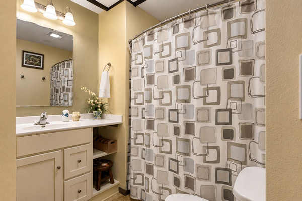 A convenient upper-level full bathroom helps make large group stays comfortable and stress-free.