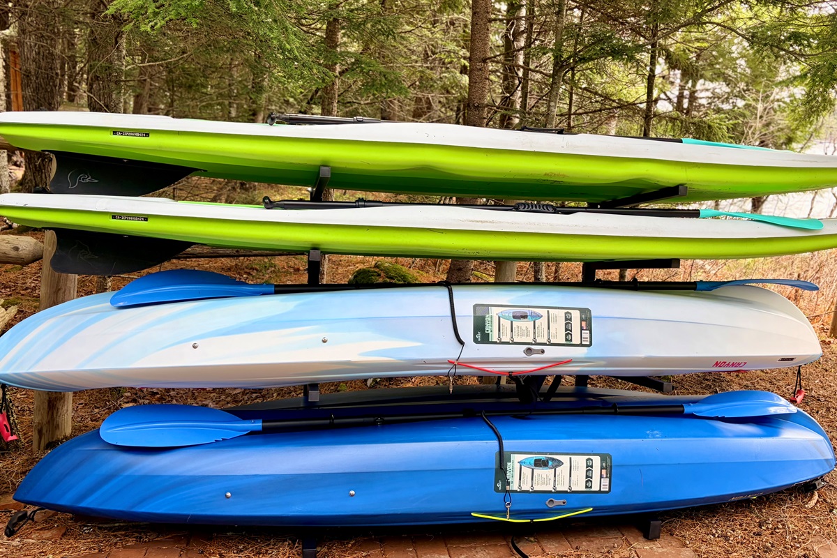 Kayaks and paddle boards by the lake!