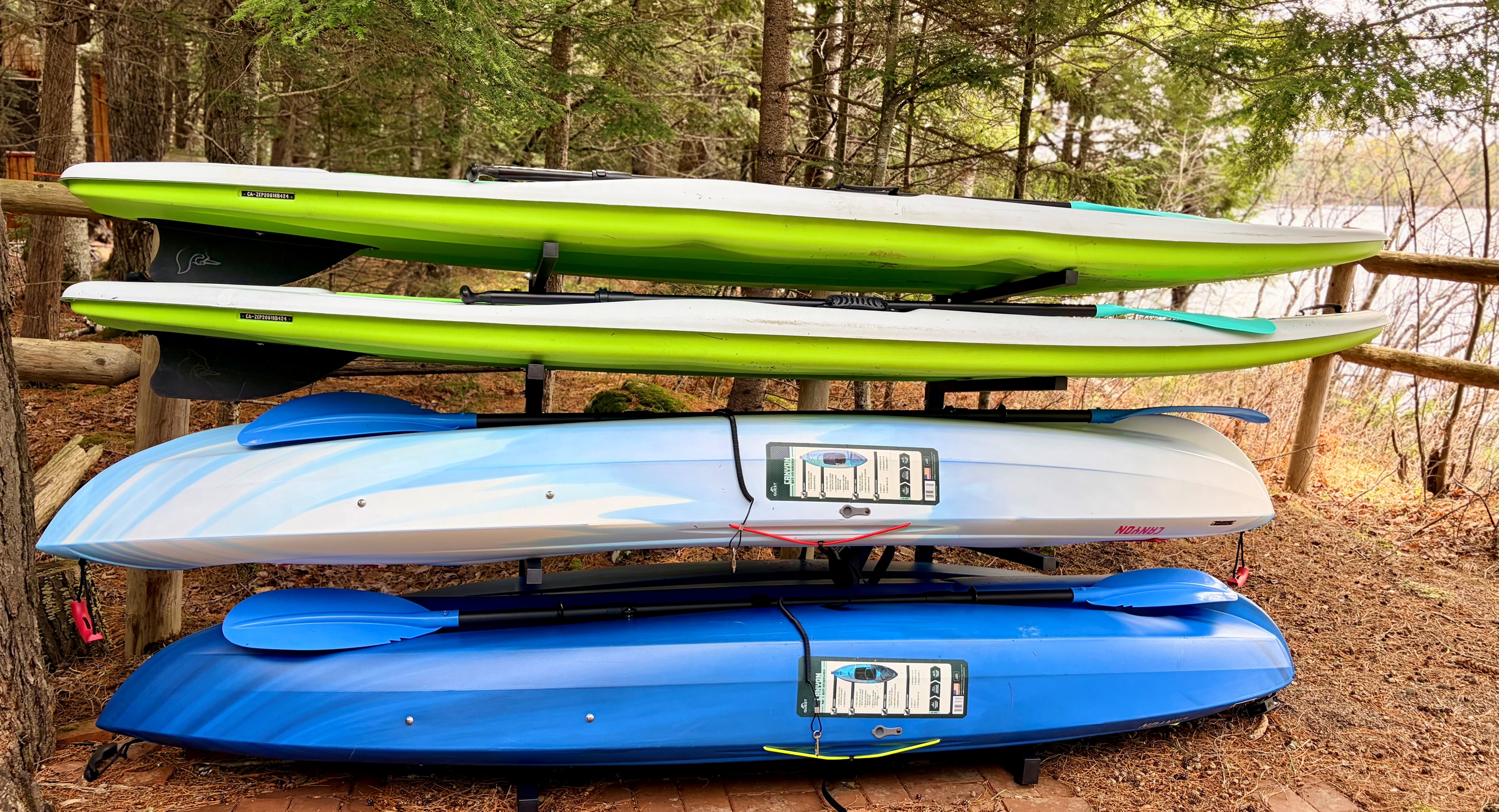 Kayaks and paddle boards by the lake!