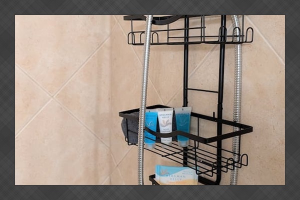 Showers have plenty of storage space, handheld shower heads with multiple spray settings, and basic toiletries including shampoo, conditioner, lotion, and bar soap. 