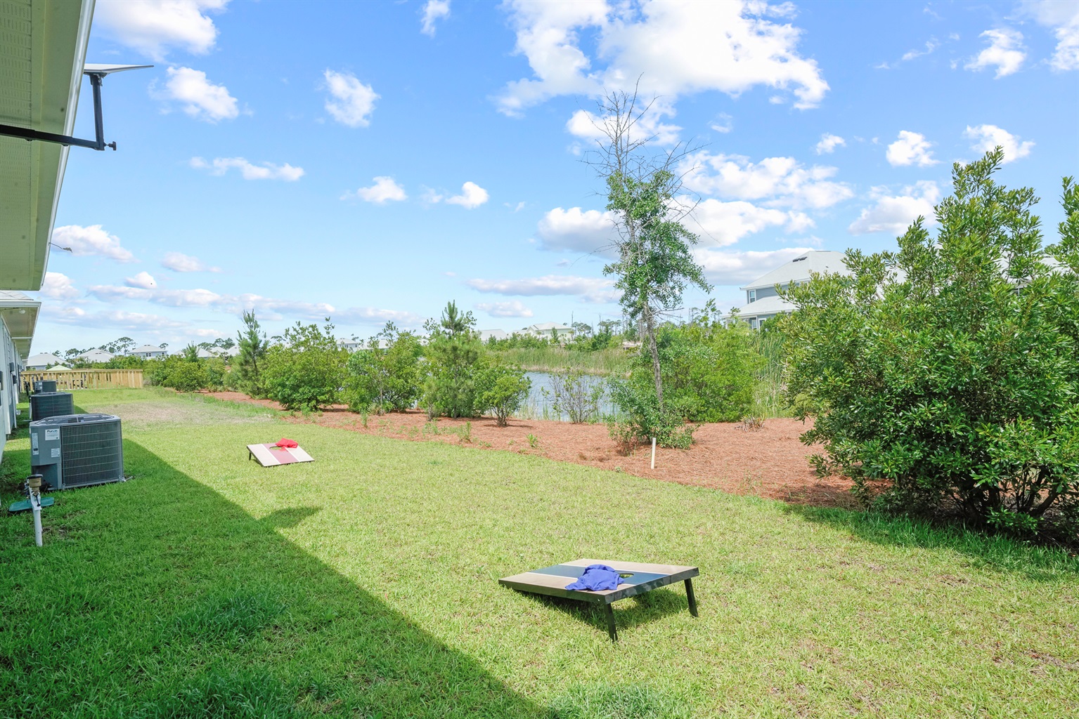 Outdoor fun awaits with complimentary cornhole available for guests