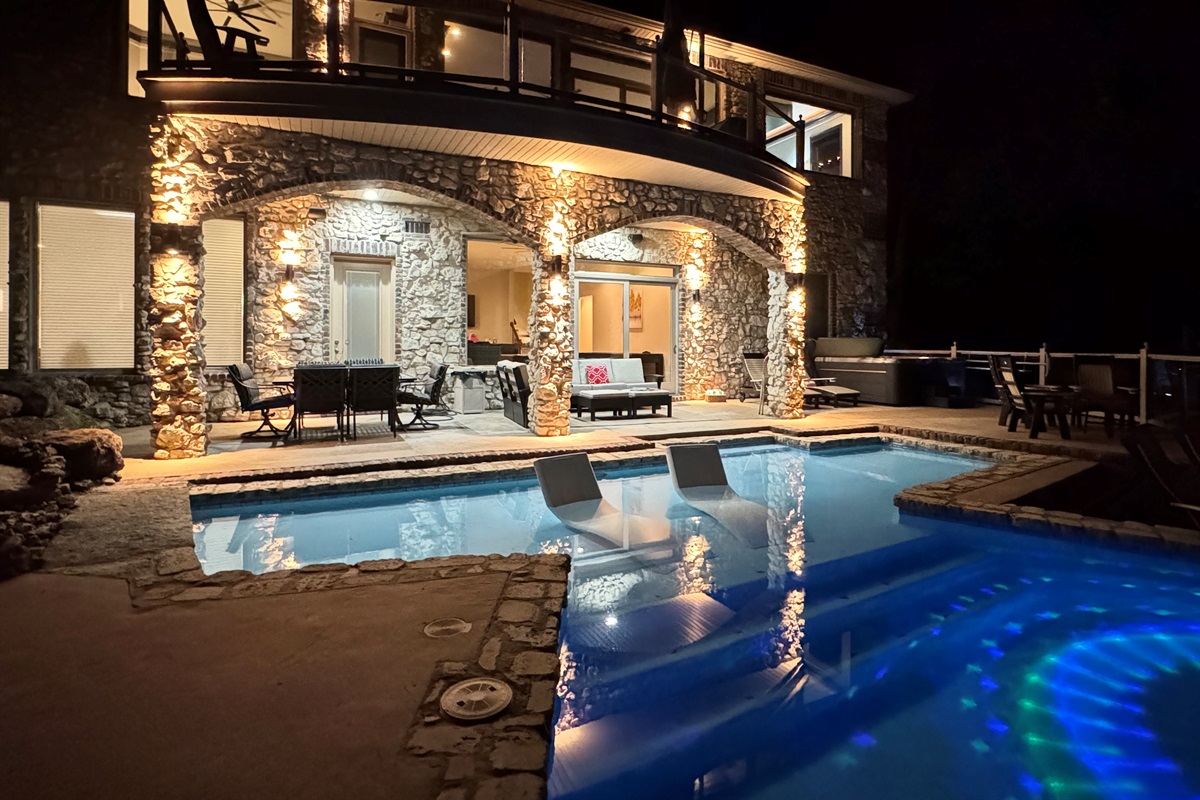 Plenty of outdoor lighting to enjoy the pool on a summer's evening.