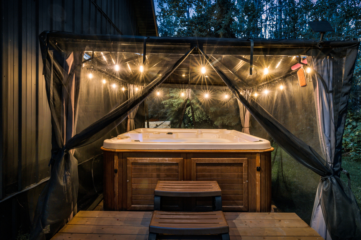 End the day with a private soak in the hot tub, tucked under a covered gazebo and surrounded by the quiet forest.