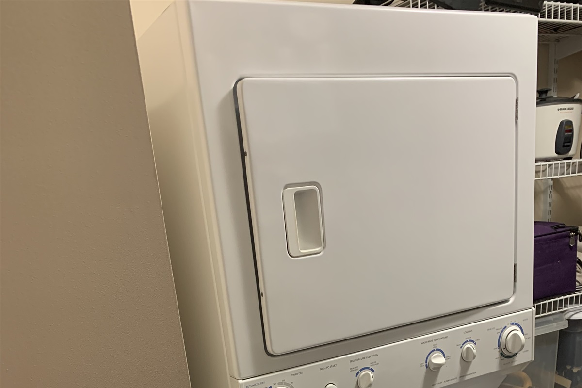 Full size washer and dryer, plus large storage room.