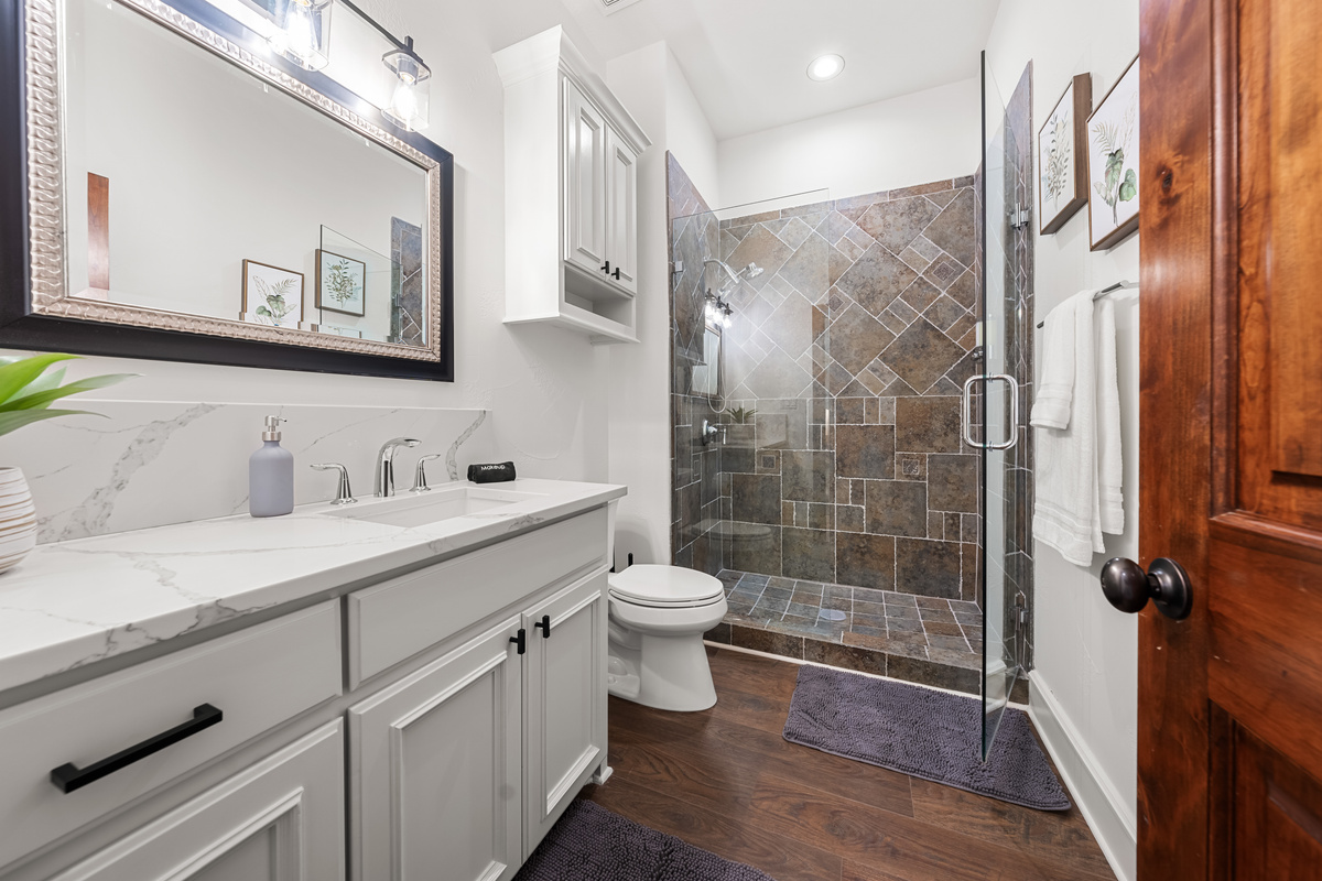 A clean, stylish bathroom upstairs to start and end your day with ease.