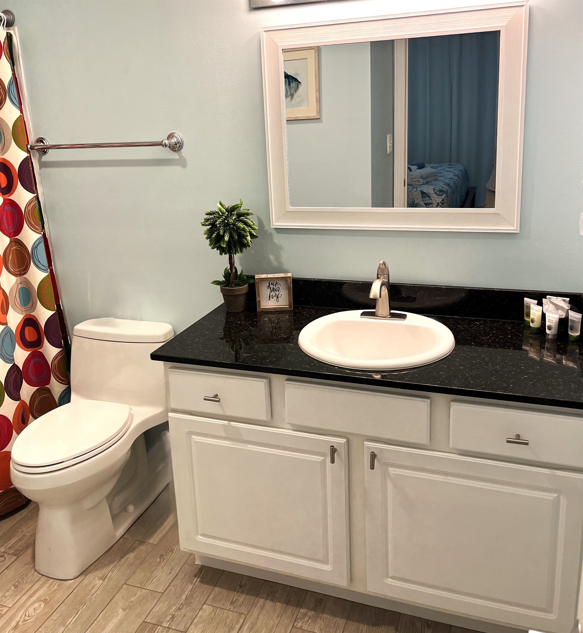 Pamper yourself after a day at the beach in the spacious primary bathroom.