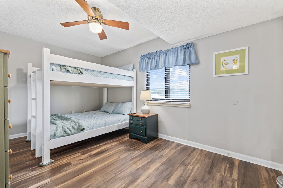 Kids bedroom with  full over full bunk bed