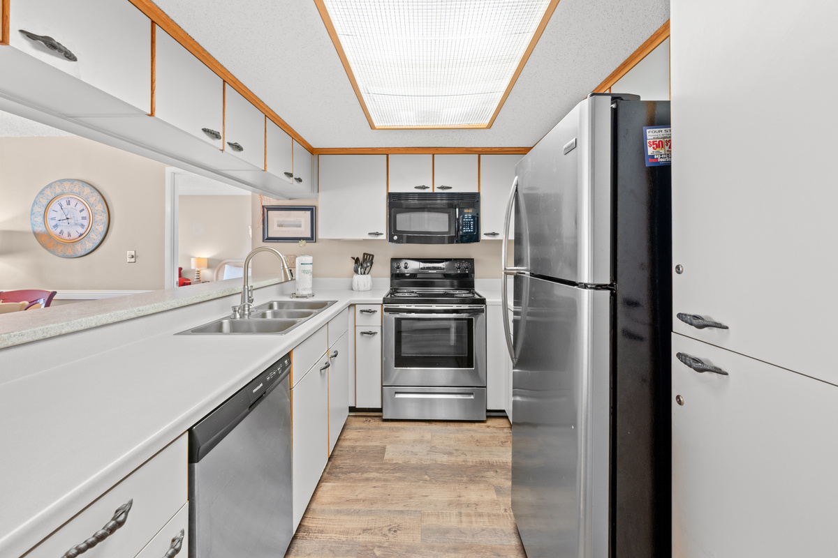 Well appointed kitchen with stainless steel appliances 