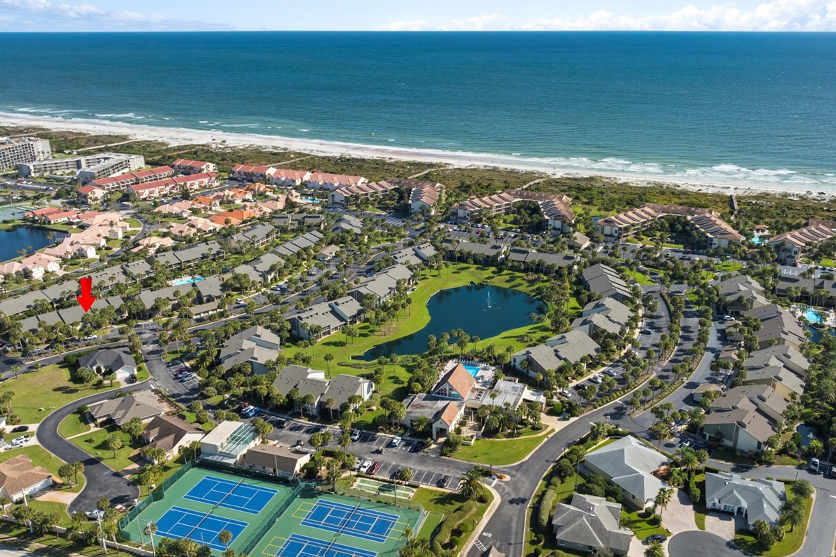 Prime location! Just a 5-minute walk to the beach via private community paths — no parking required. Stay steps from the shoreline with resort amenities at your fingertips.”