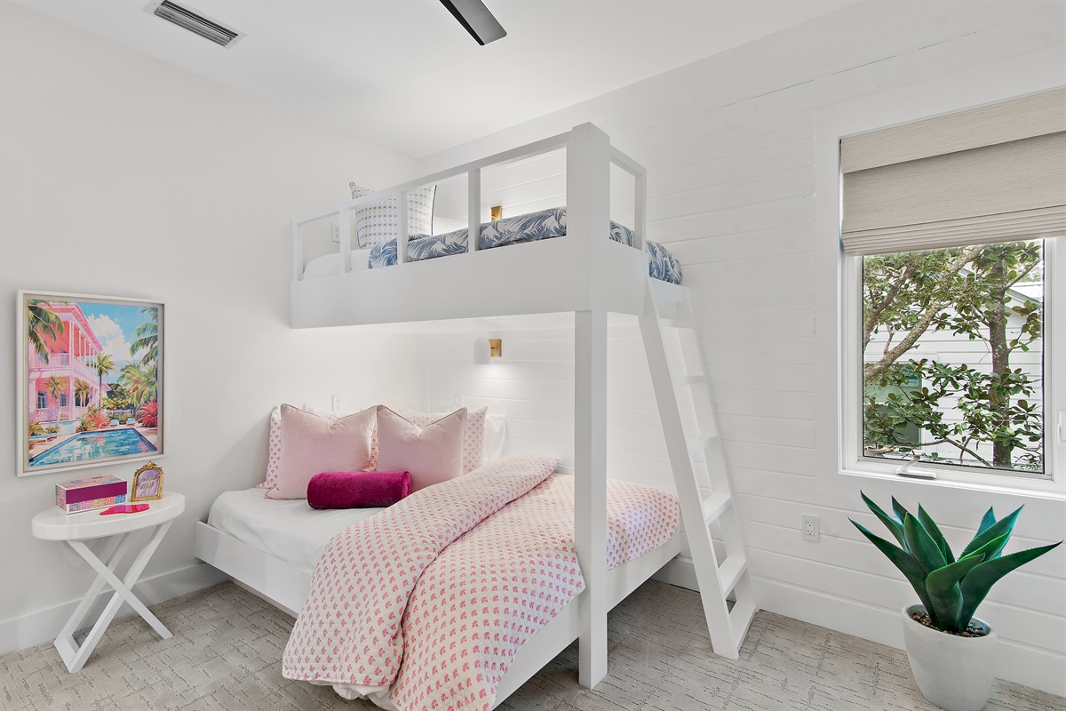 The upstairs bunk room offers a twin over a queen bed.
