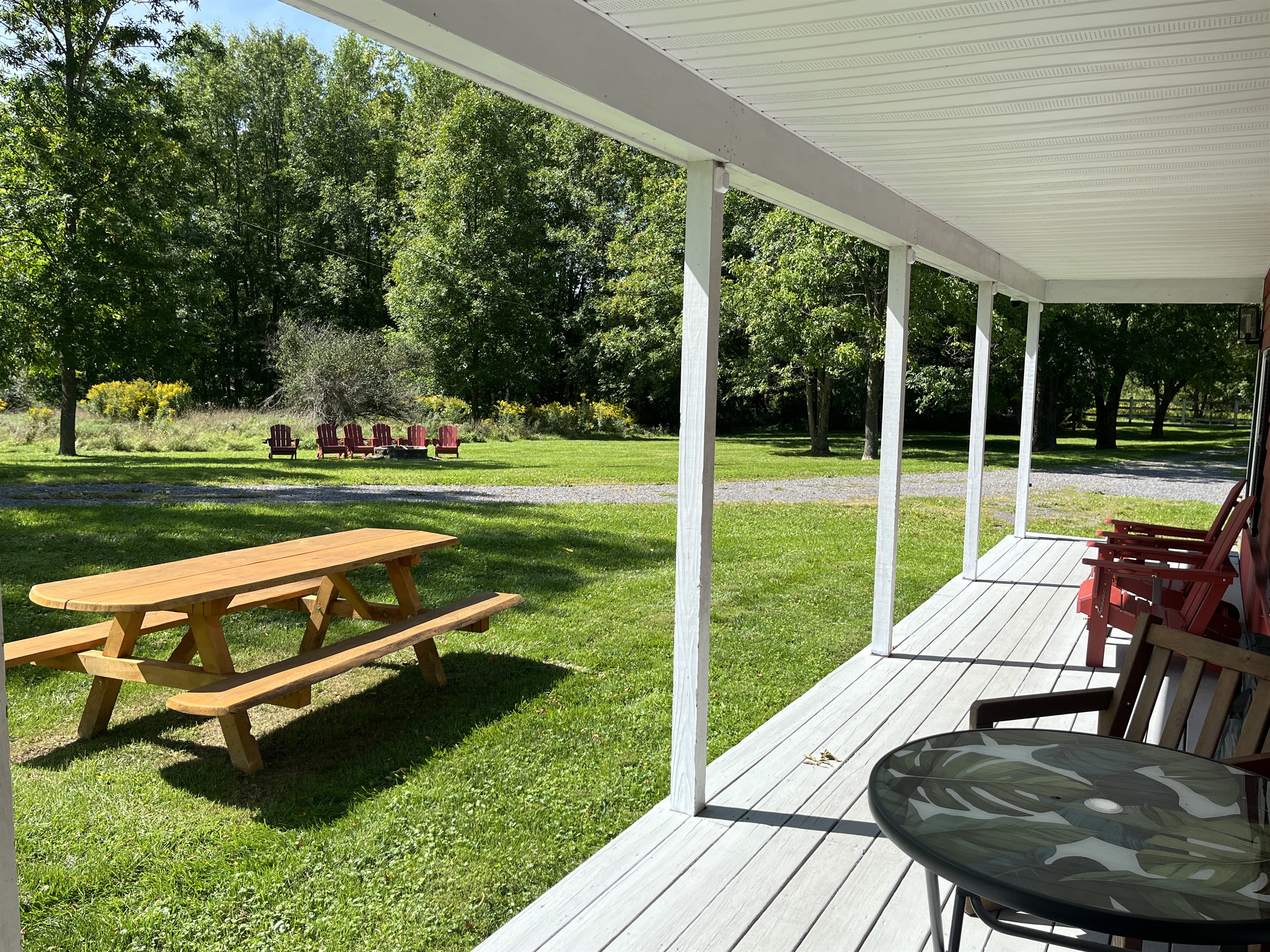 Porch, picnic table and fire pit