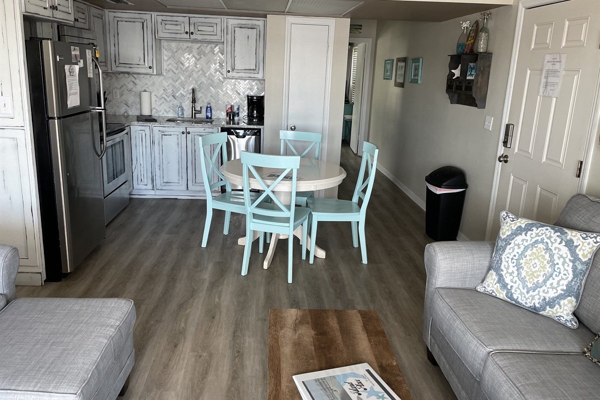 View toward fully equipped kitchen
