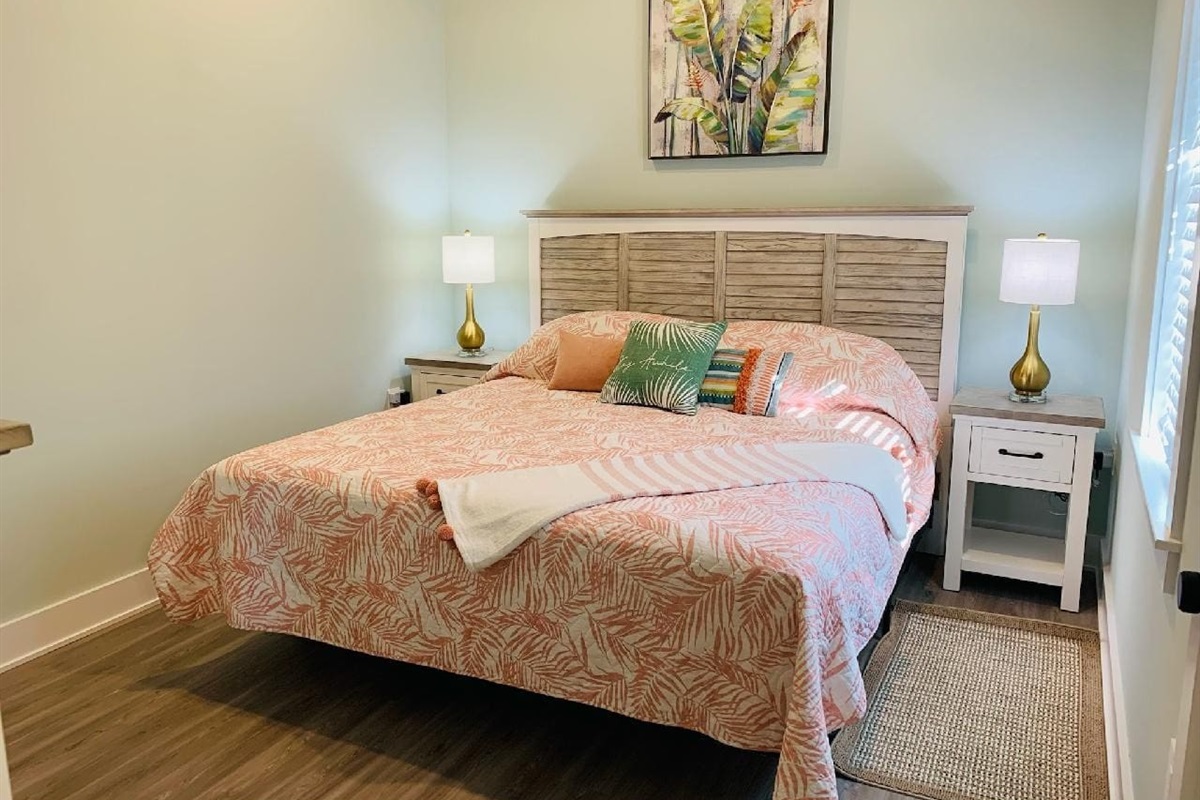Master bedroom with USB chargers on the rear of the nightstands.  