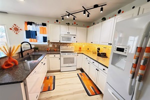 Fully equipped kitchen. Cook, dine, and enjoy in style!