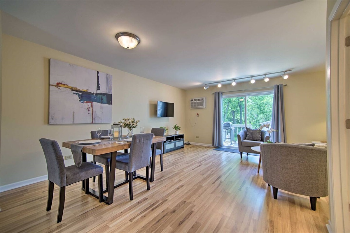 The living and dining room area is open and inviting, giving you plenty of space to relax.