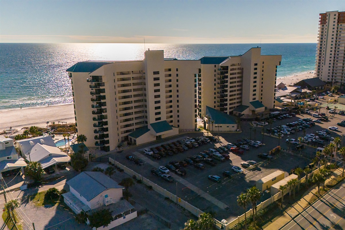 Private gated resort with direct beachfront access — no streets to cross.