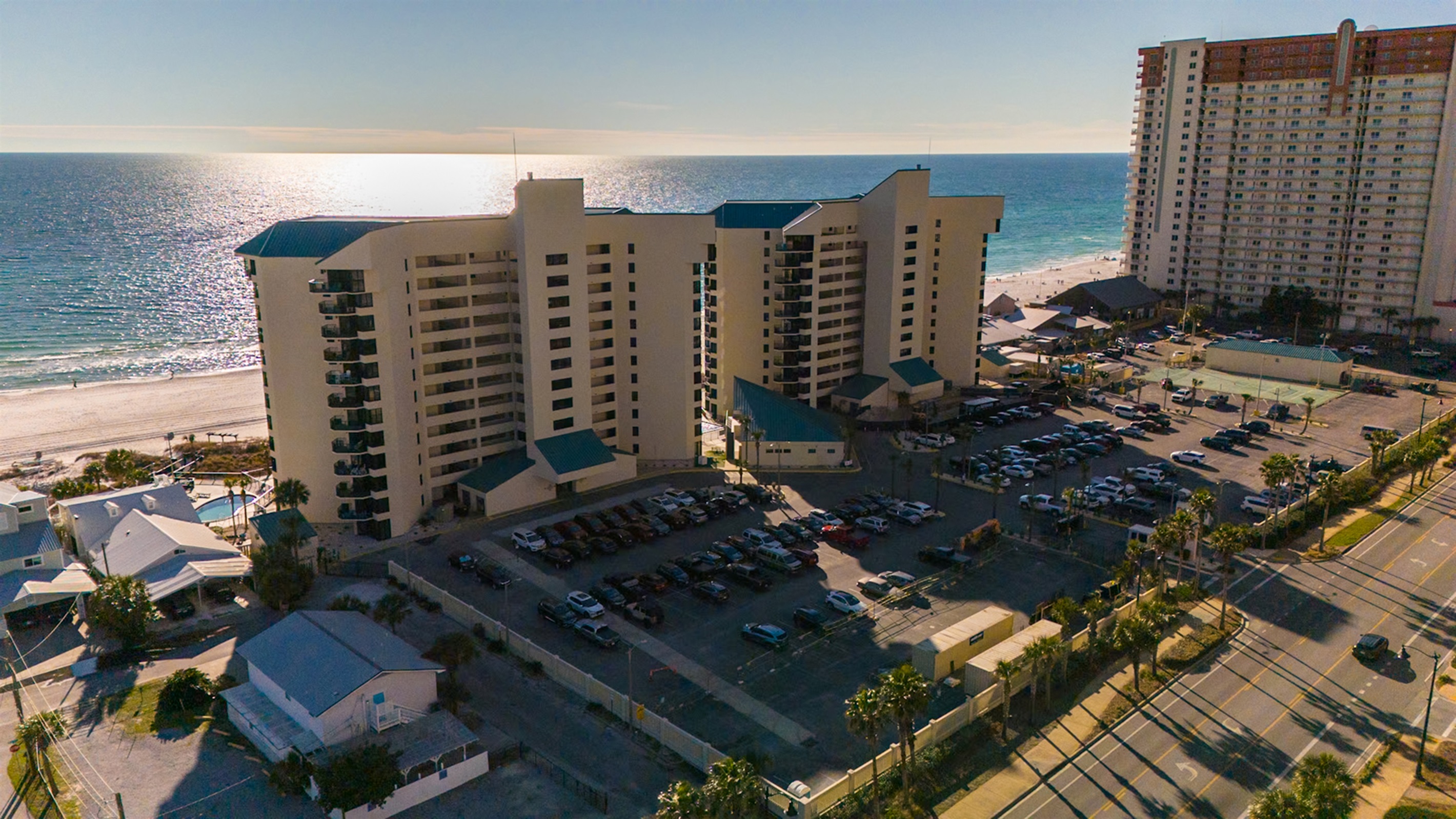 Private gated resort with direct beachfront access — no streets to cross.