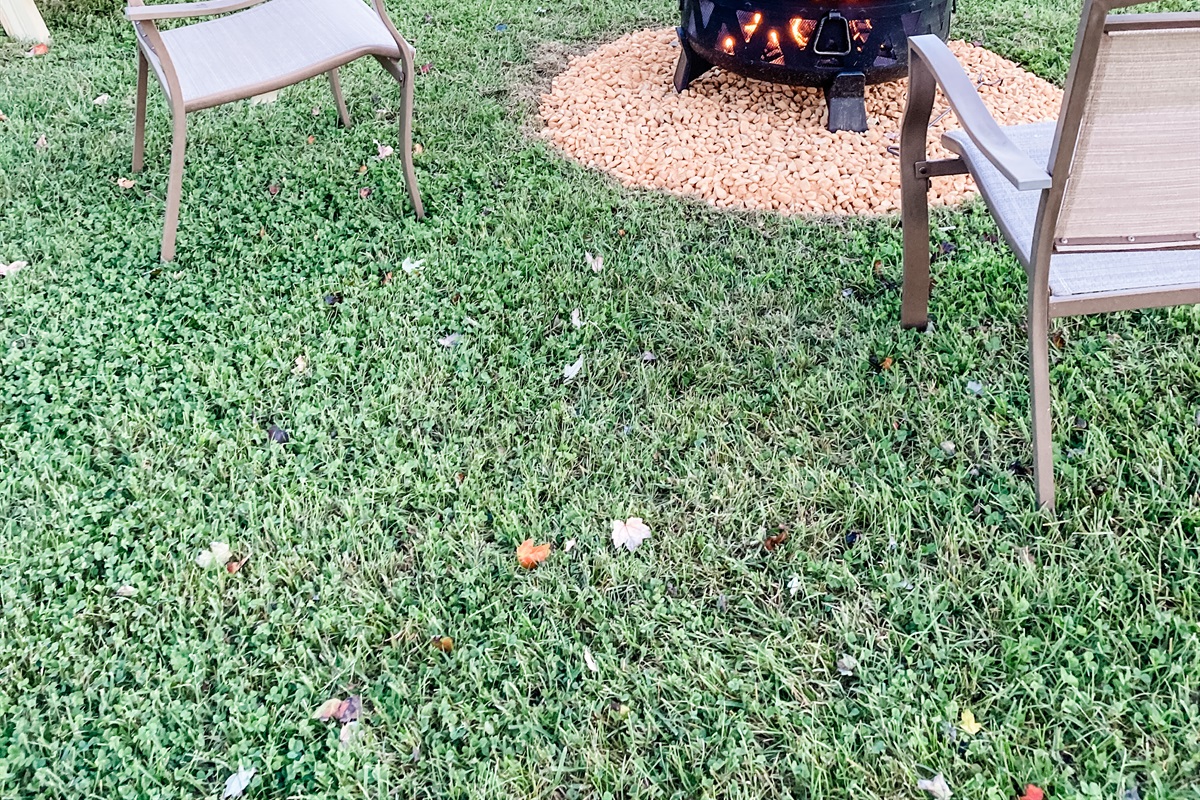 Relax around the firepit while looking out at the hills and farm land