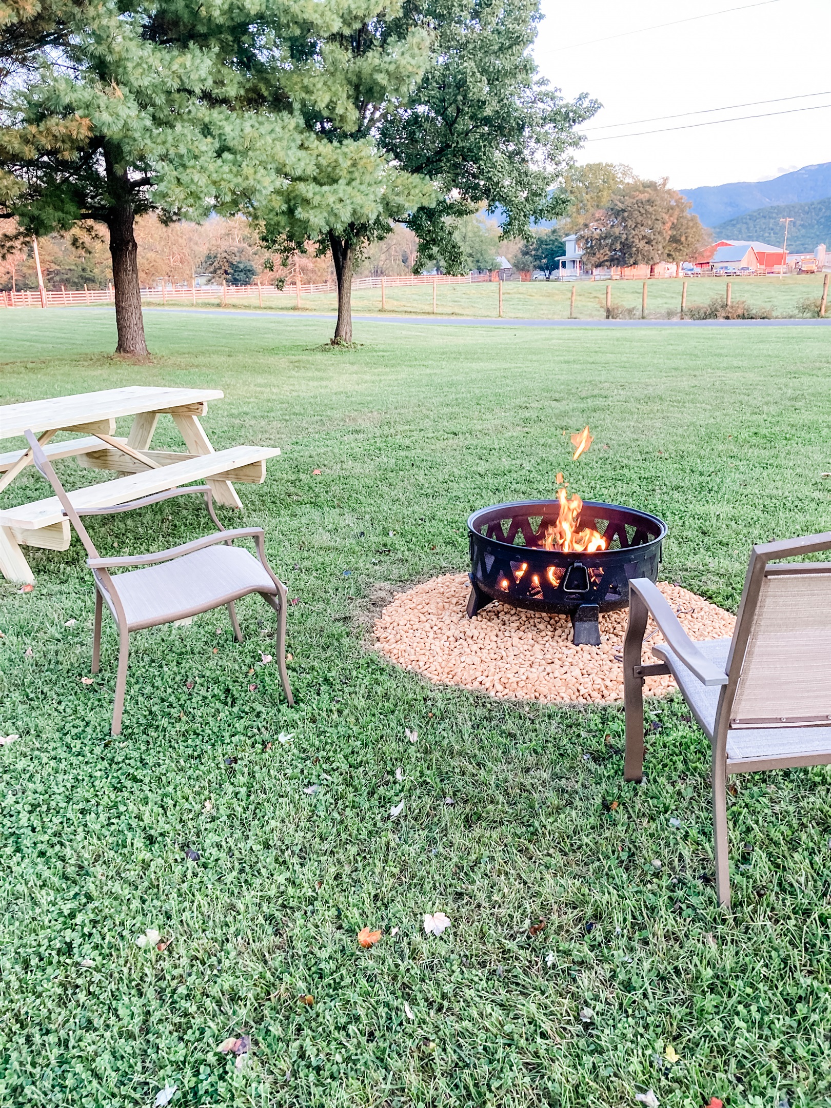 Relax around the firepit while looking out at the hills and farm land