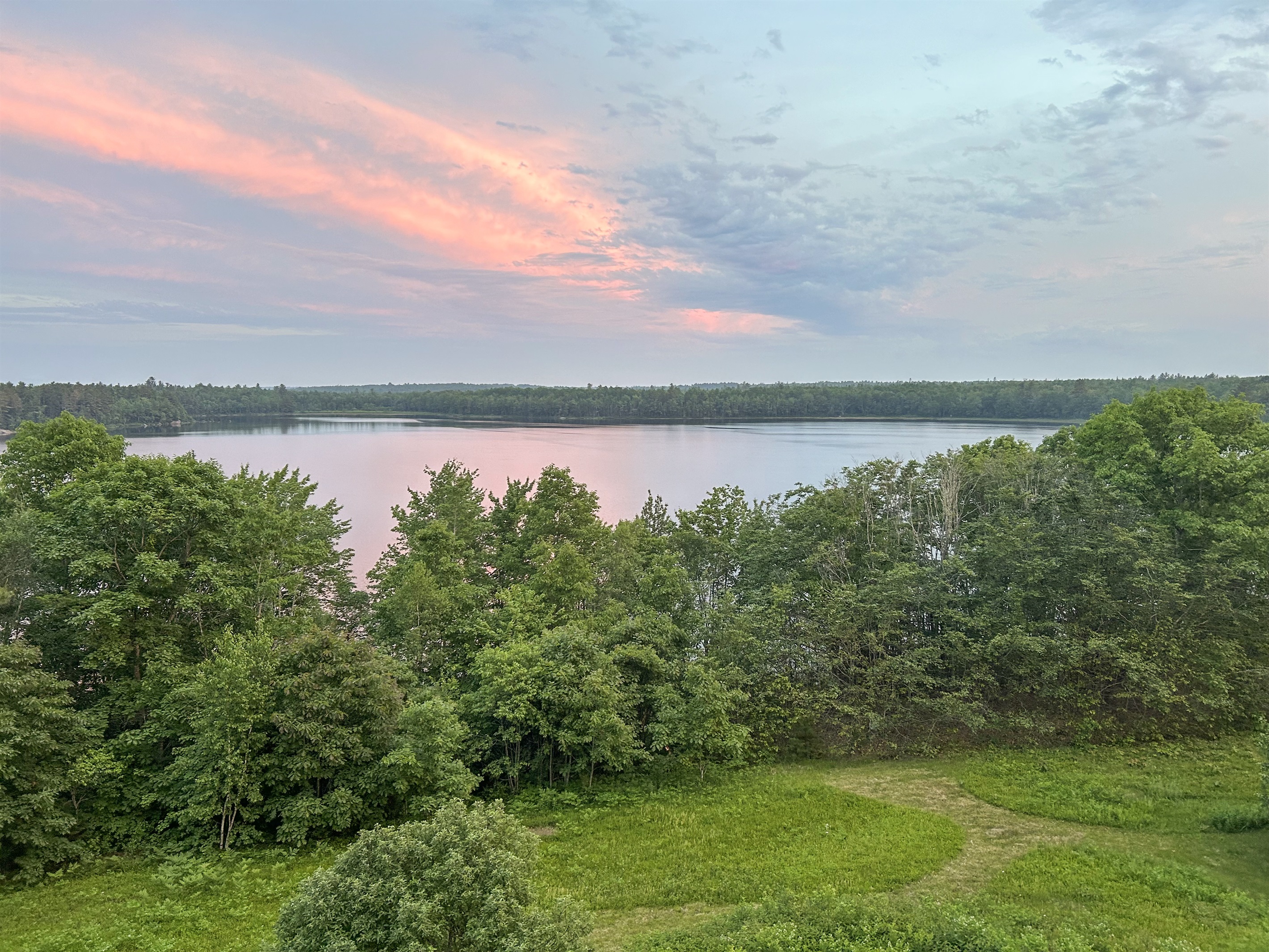 Sunset and trees view from the porch of the Dome