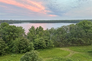 Sunset and trees view from the porch of the Dome