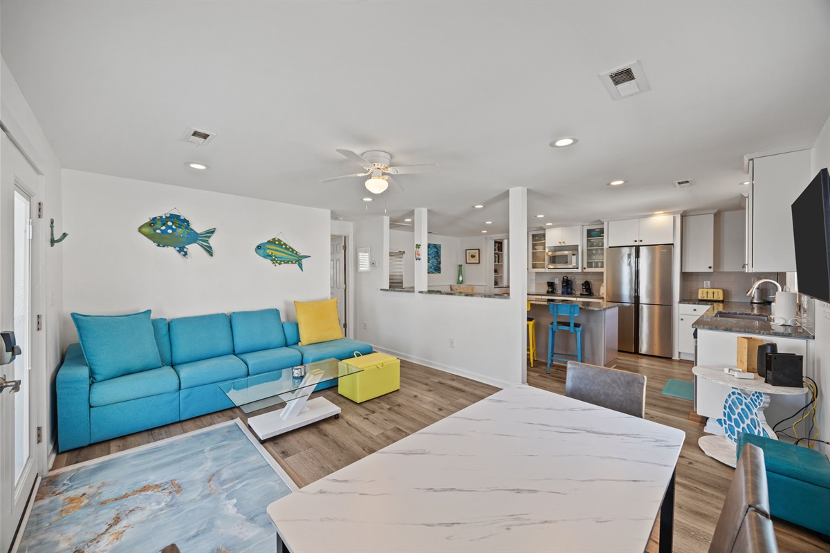 Seamless flow between living, dining, and kitchen areas designed for easy gathering and comfort