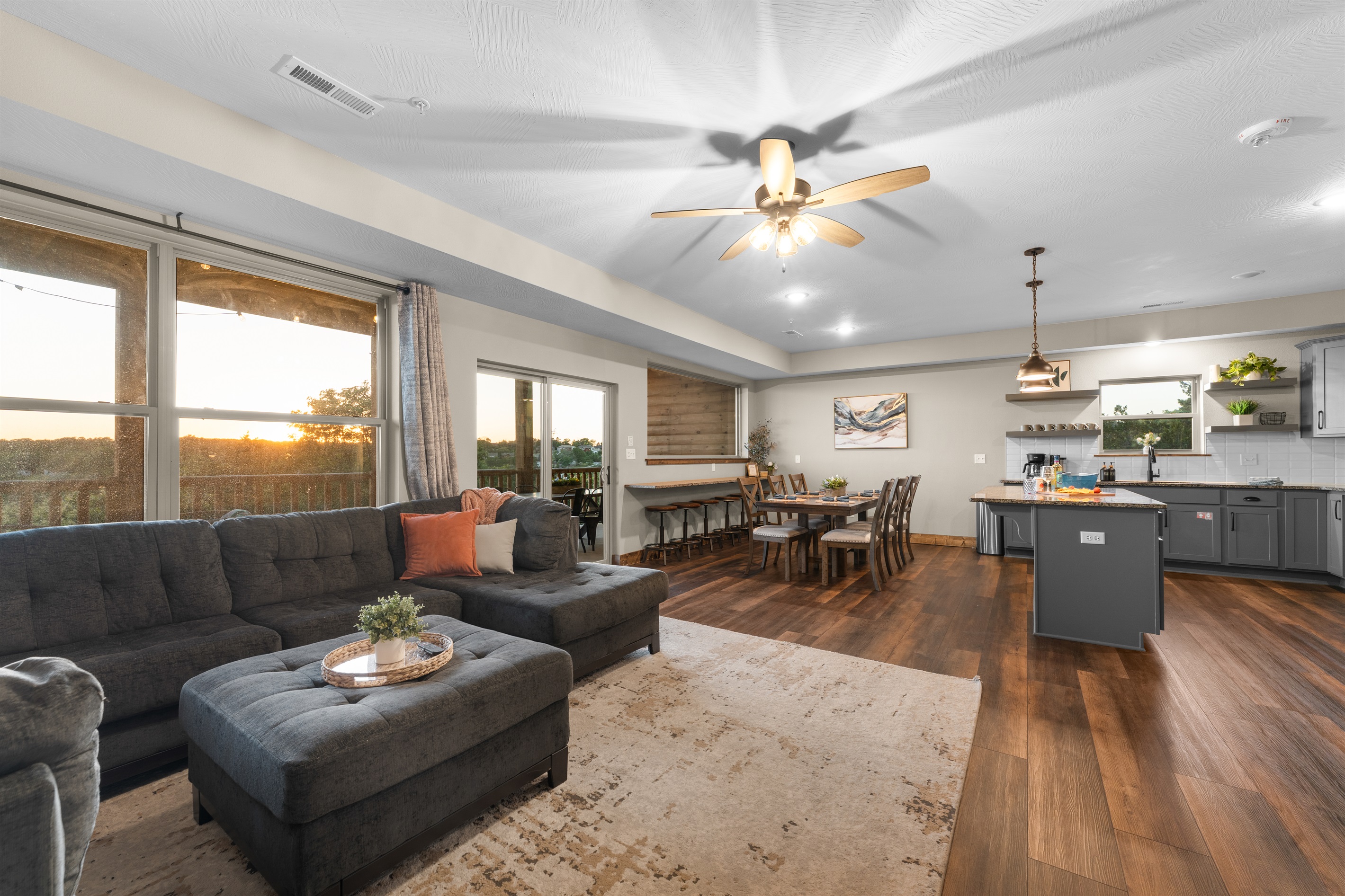 Open-concept main level keeps everyone connected from kitchen to couch.