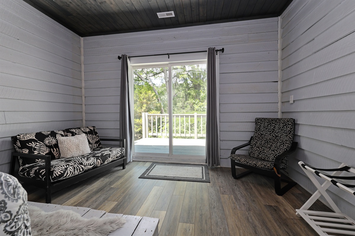 Bedroom 1 with Queen bed, access to deck and ensuite bathroom
