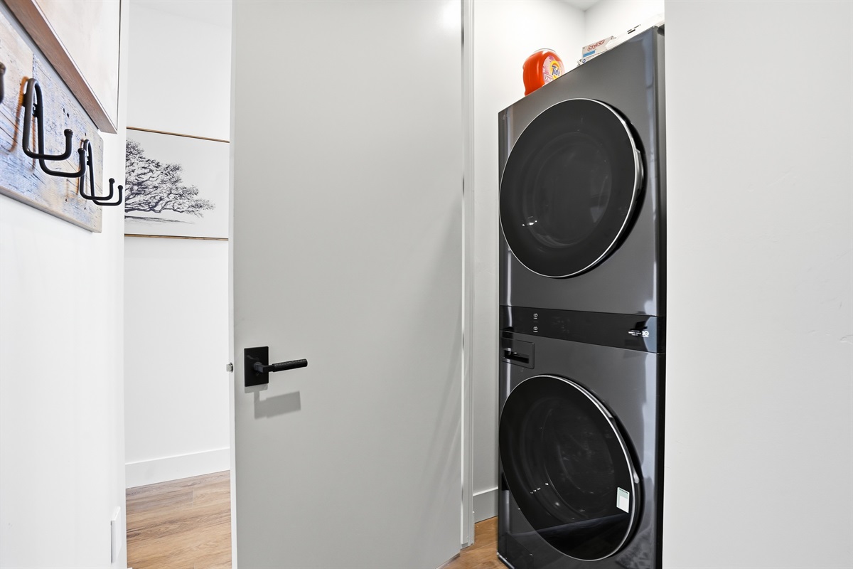 Sleek Stacked Laundry Machines Provided for Your Convenience
