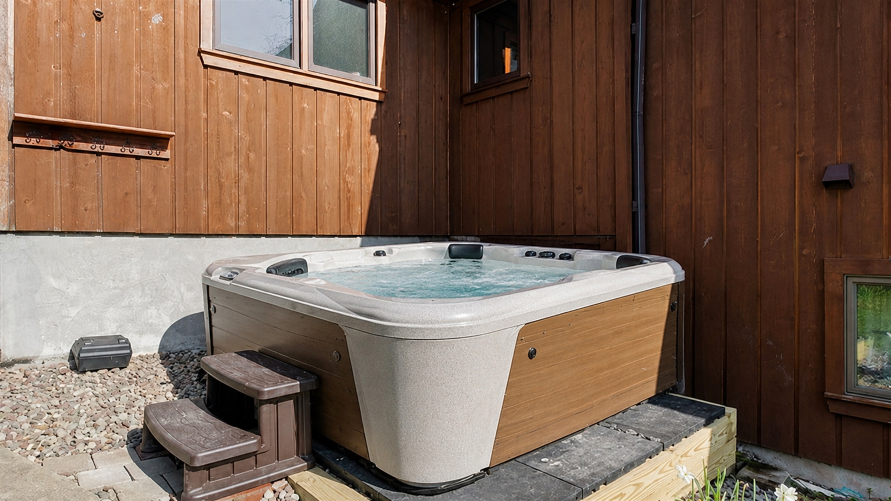 Fire Pit / Hot Tub (alongside the main house) - Unwind in our outdoor hot tub, perfect for relaxing after a day of exploring nearby attractions. Ideal for a soothing retreat. 