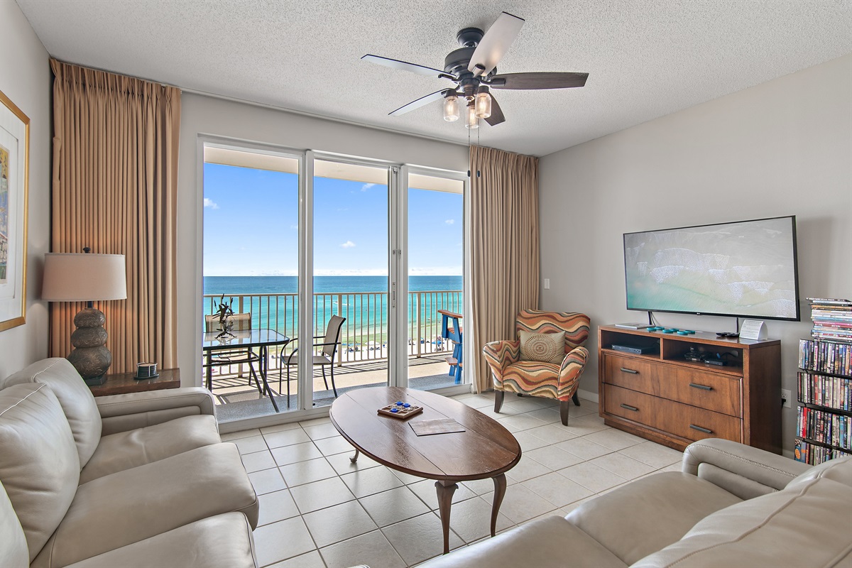 Spacious living area with plenty of seating, New Leather Sleeper Sofa and Love Seat, Gulf views, 65" Smart TV with easy access to Roku, Prime TV, Netflix, and more!