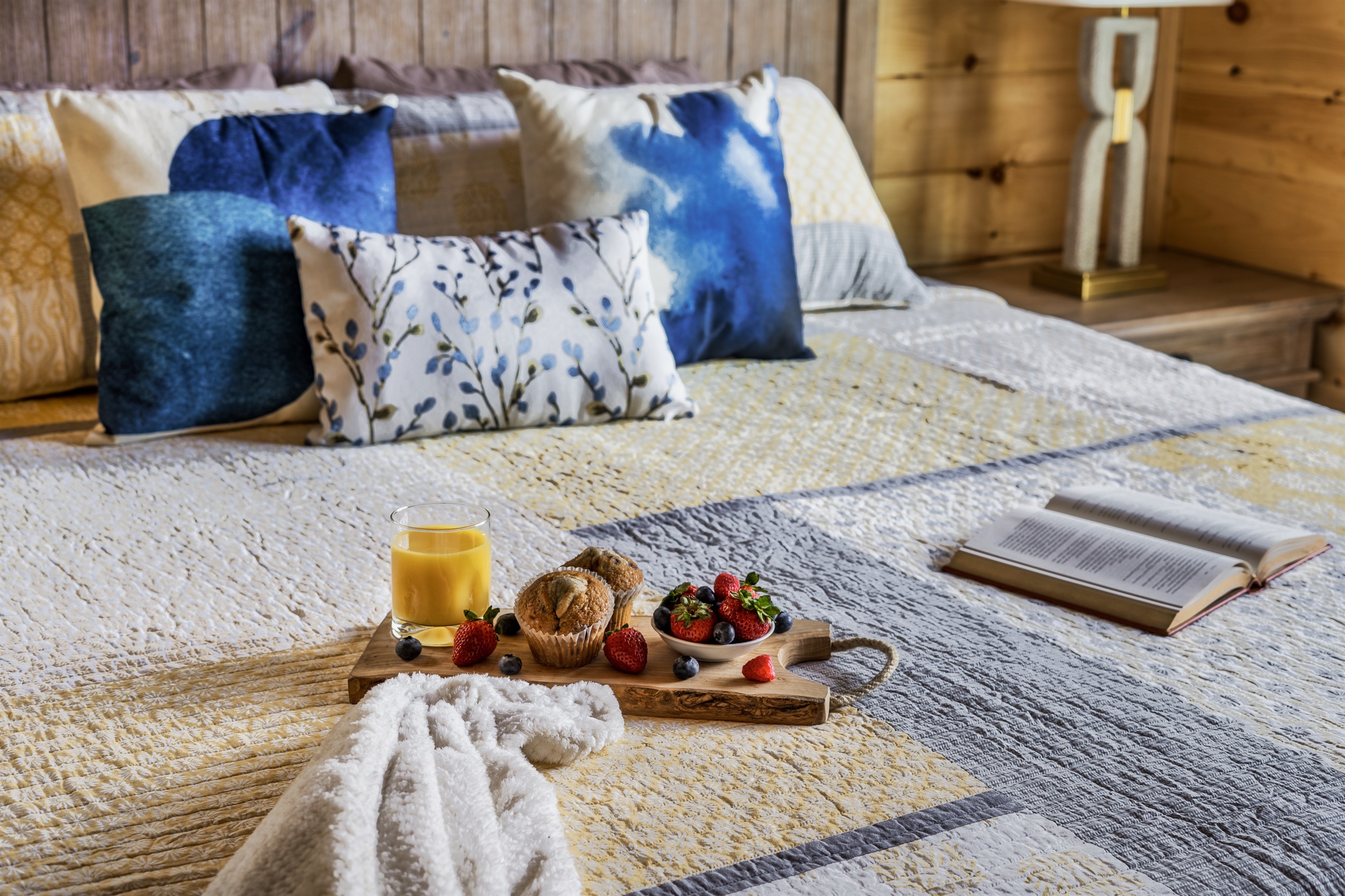 Discover serenity in the first upstairs king bedroom, thoughtfully appointed with a smart LED TV and an en-suite bath.