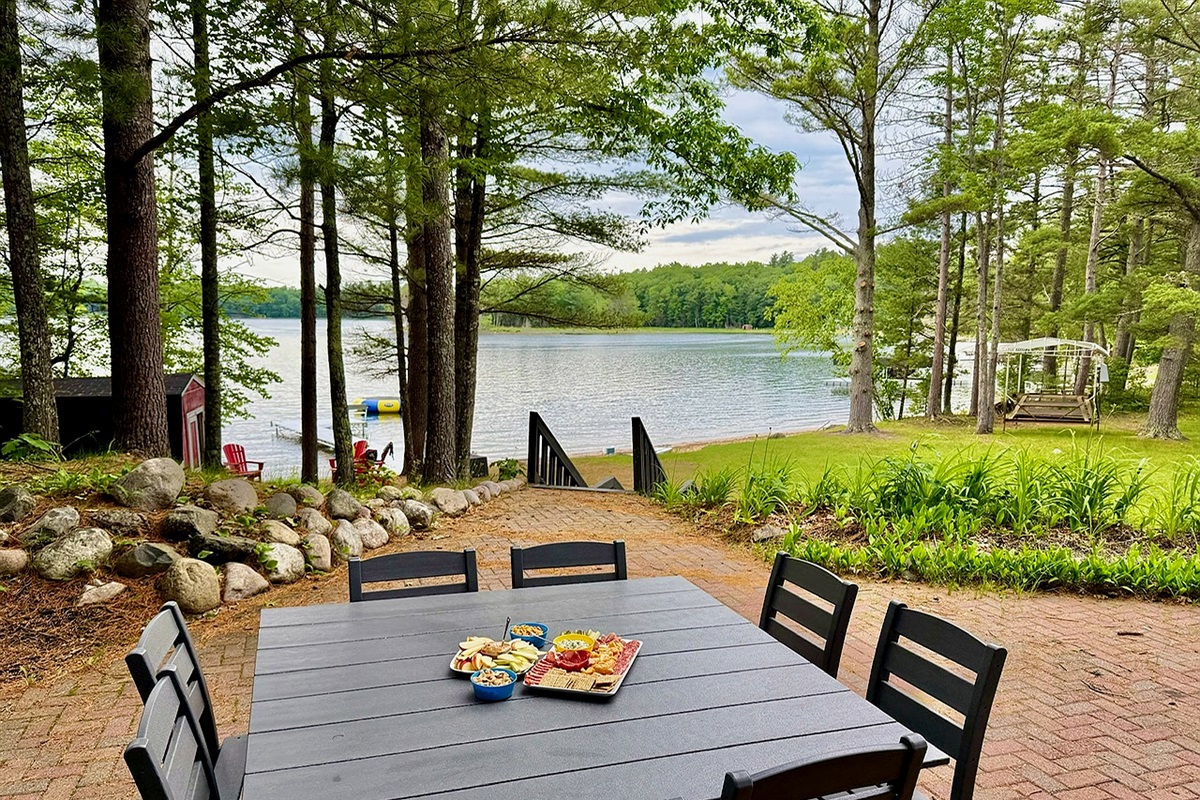 Relax and enjoy a meal or snacks on our patio overlooking the lake and yard