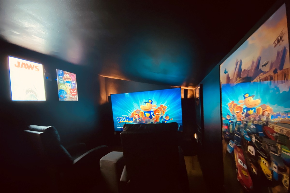 Step into your very own private cinema experience at our cabin!