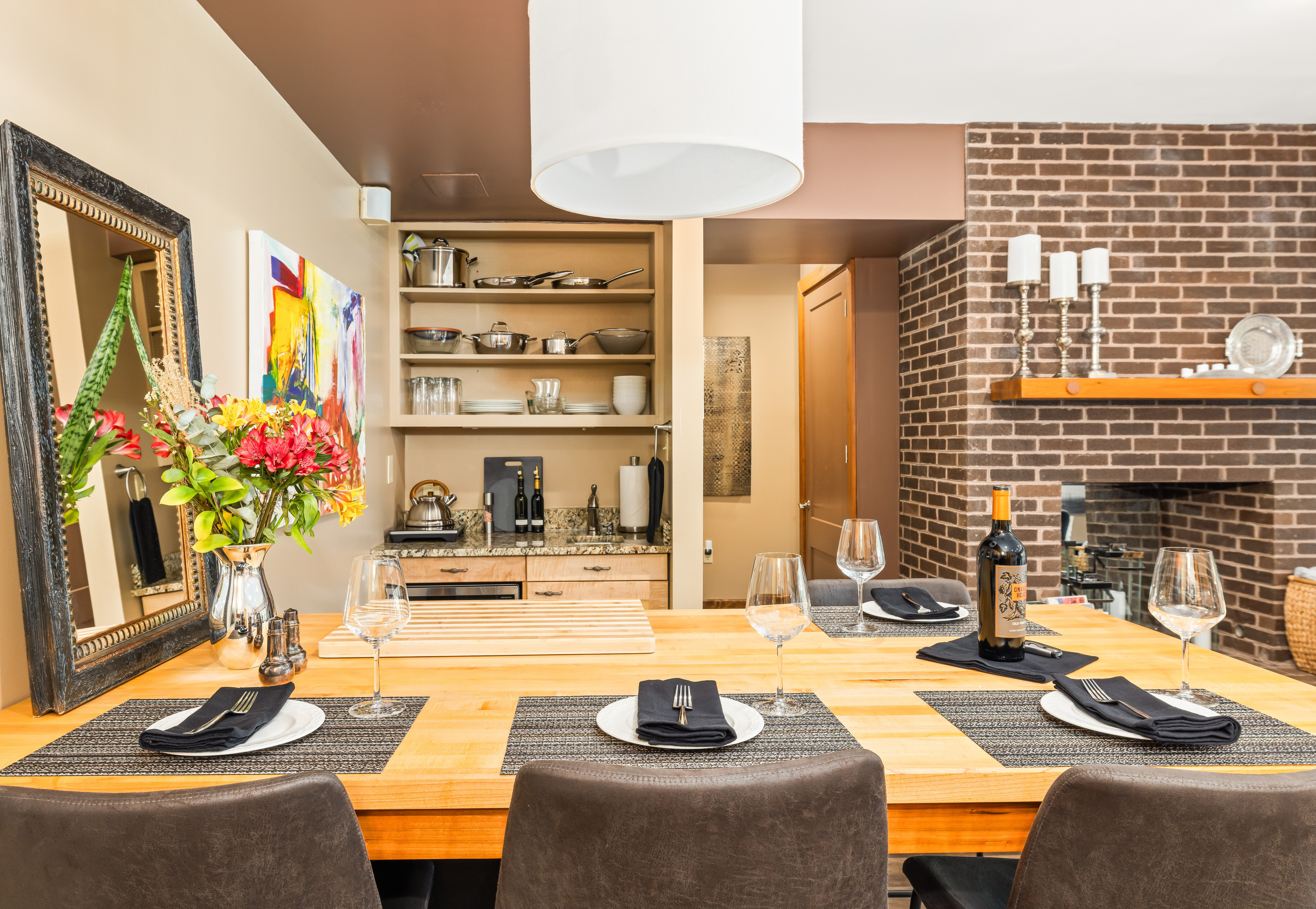 Dining Island seats 4-5 (ask for 5th stool) and doubles as a prep counter for the fully-stocked Kitchenette. Two undercounter refrigerator/freezers, located below island make meal prep easy.