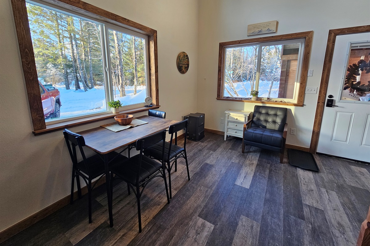 Downstairs (cabin is still being furnished, dining table will seat 4 but may look different.)