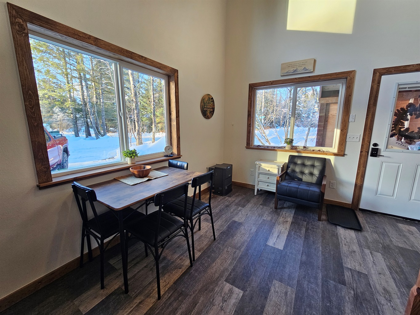 Downstairs (cabin is still being furnished, dining table will seat 4 but may look different.)