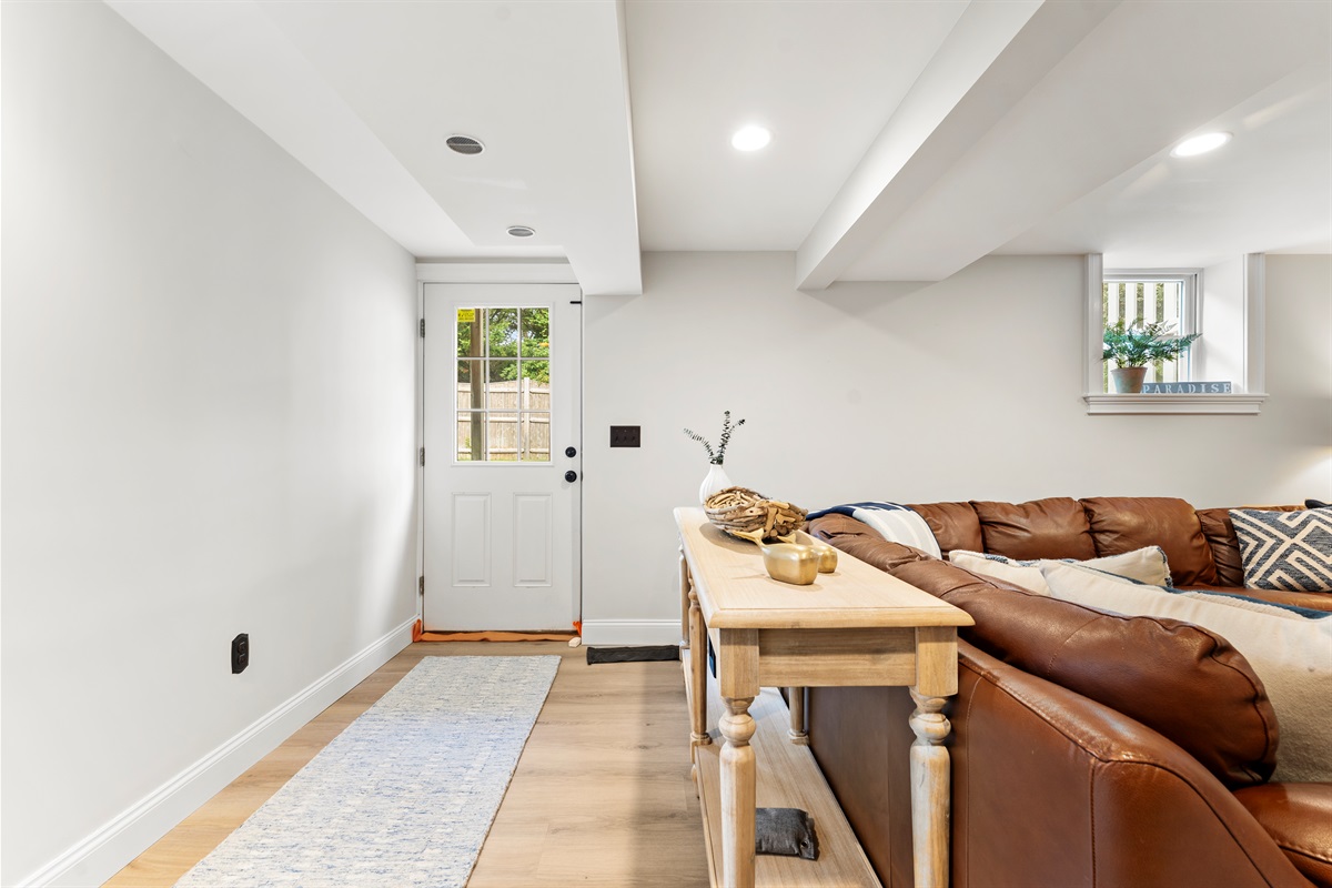 A warm and welcoming basement hangout, designed for comfort and good times.