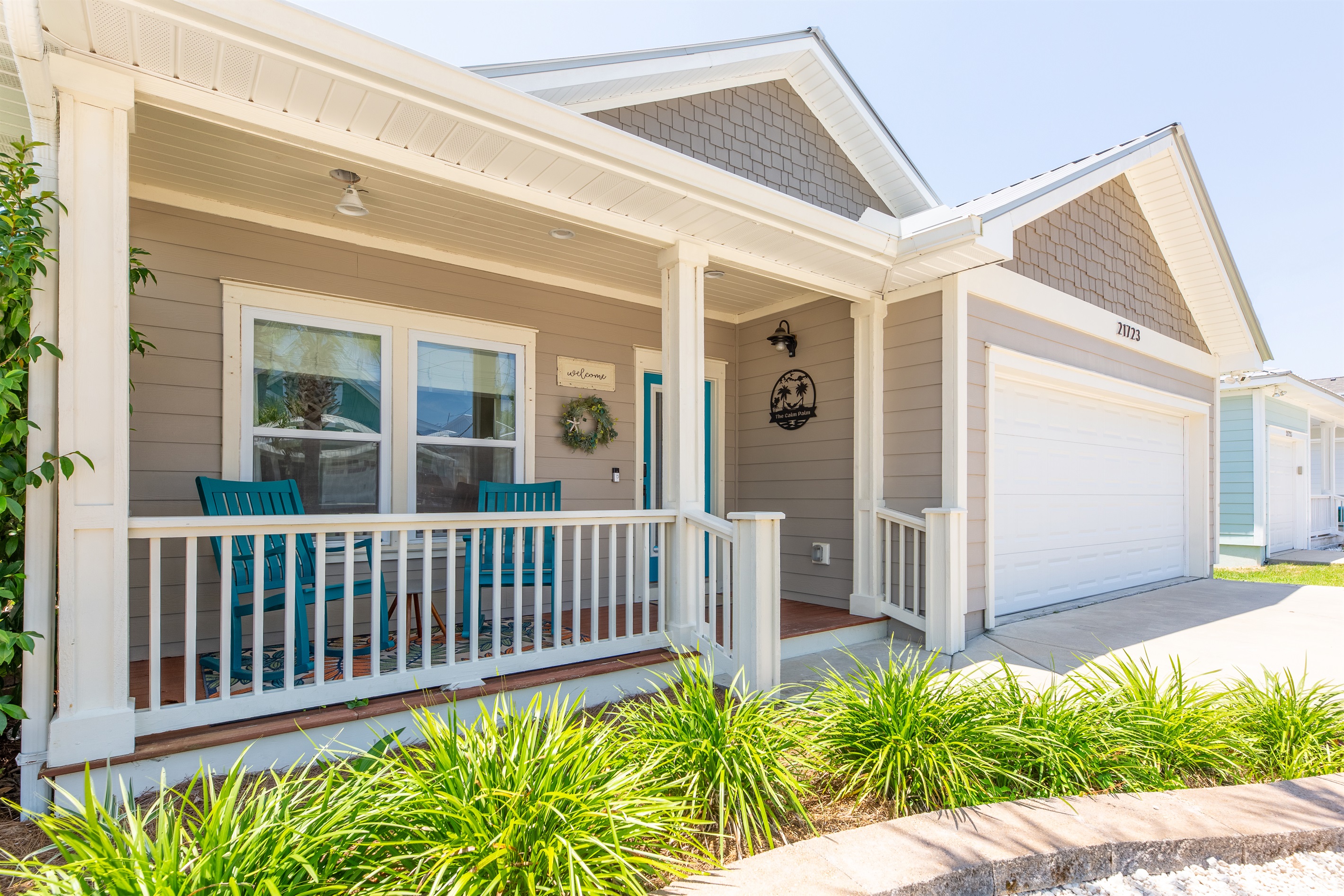 Cozy front porch with two rockers to rock away your worries! 