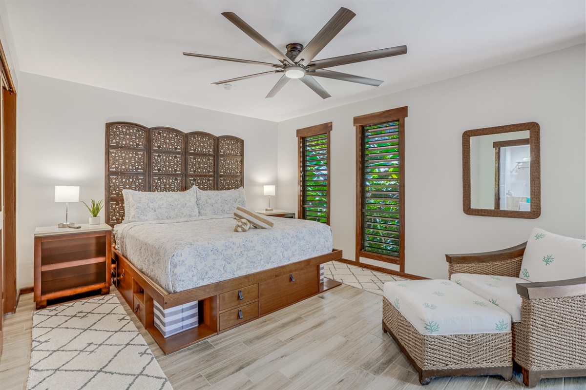 Large master bedroom includes a sitting area