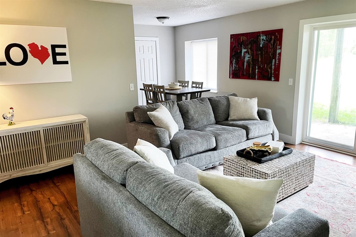 LIving room opens to private patio