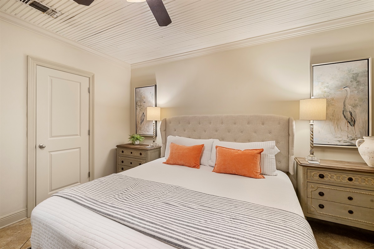 Stylish king bed with elegant decor, soft lighting, and serene vibes await