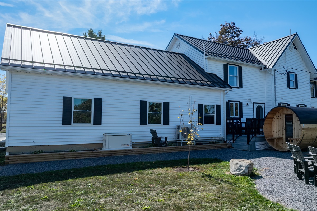 Inviting front porch with cozy touches — the perfect welcome to your upstate New York stay