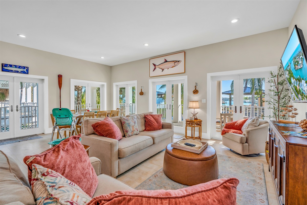 Doors on every wall provide panoramic views of the palm trees and beautiful landscaping.