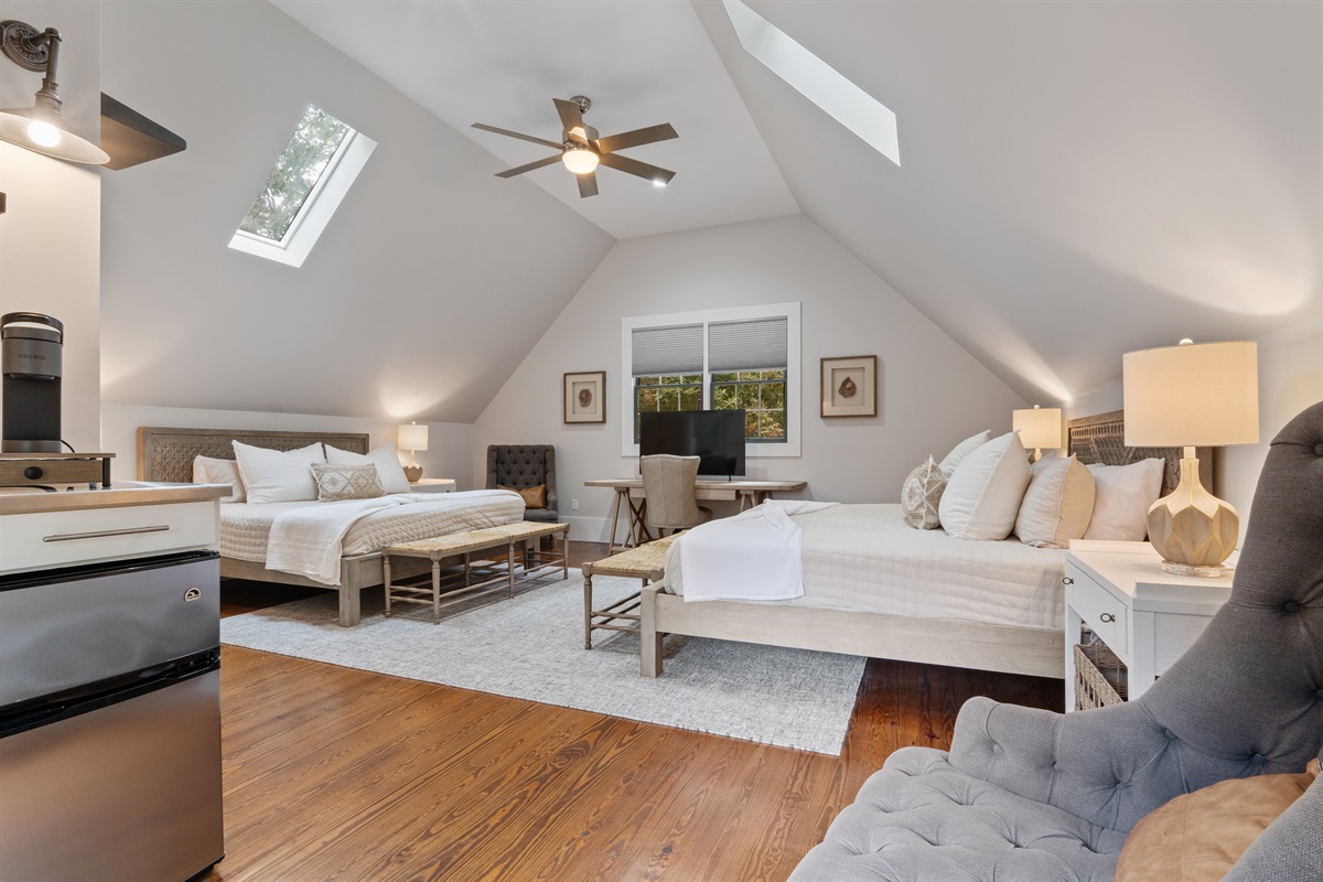 The carriage house features updated décor and premium bedding, offering a stylish and comfortable retreat for guests.
